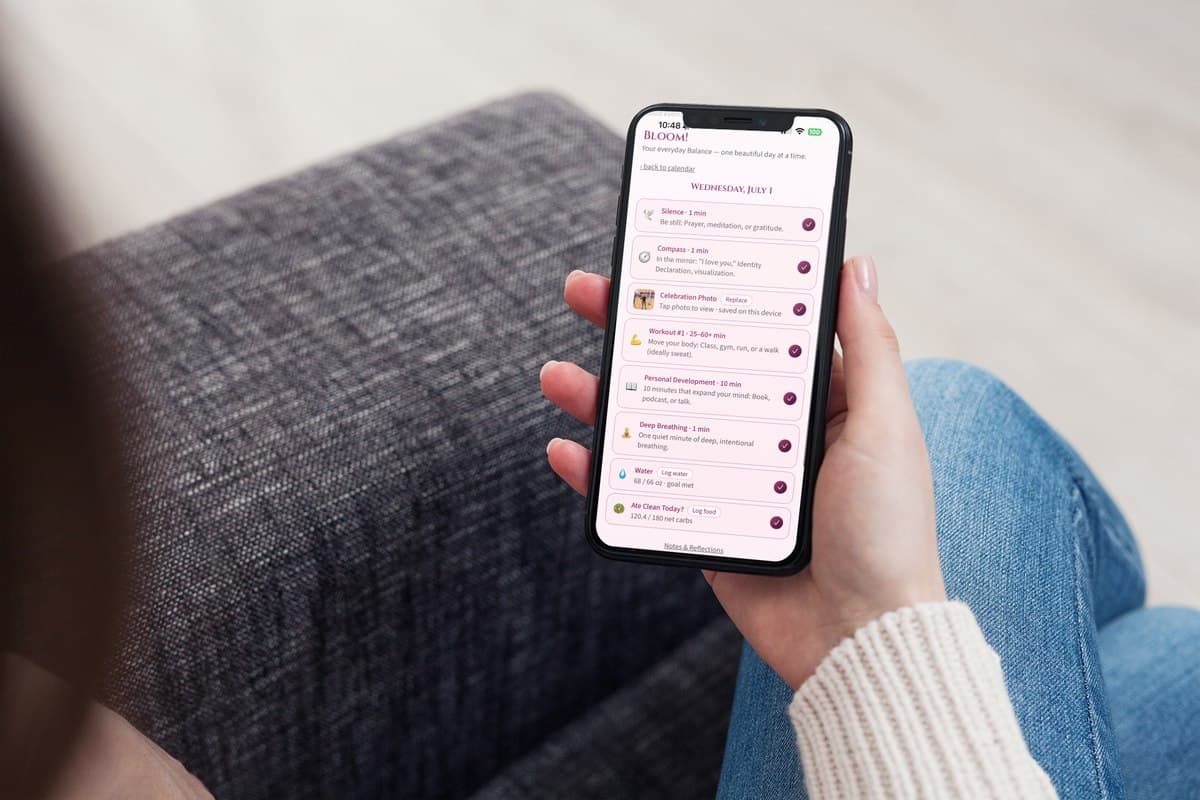 A woman using the 8Beautiful app on her phone — her daily checklist